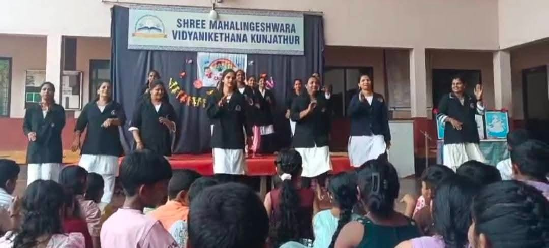 Staff performing on stage